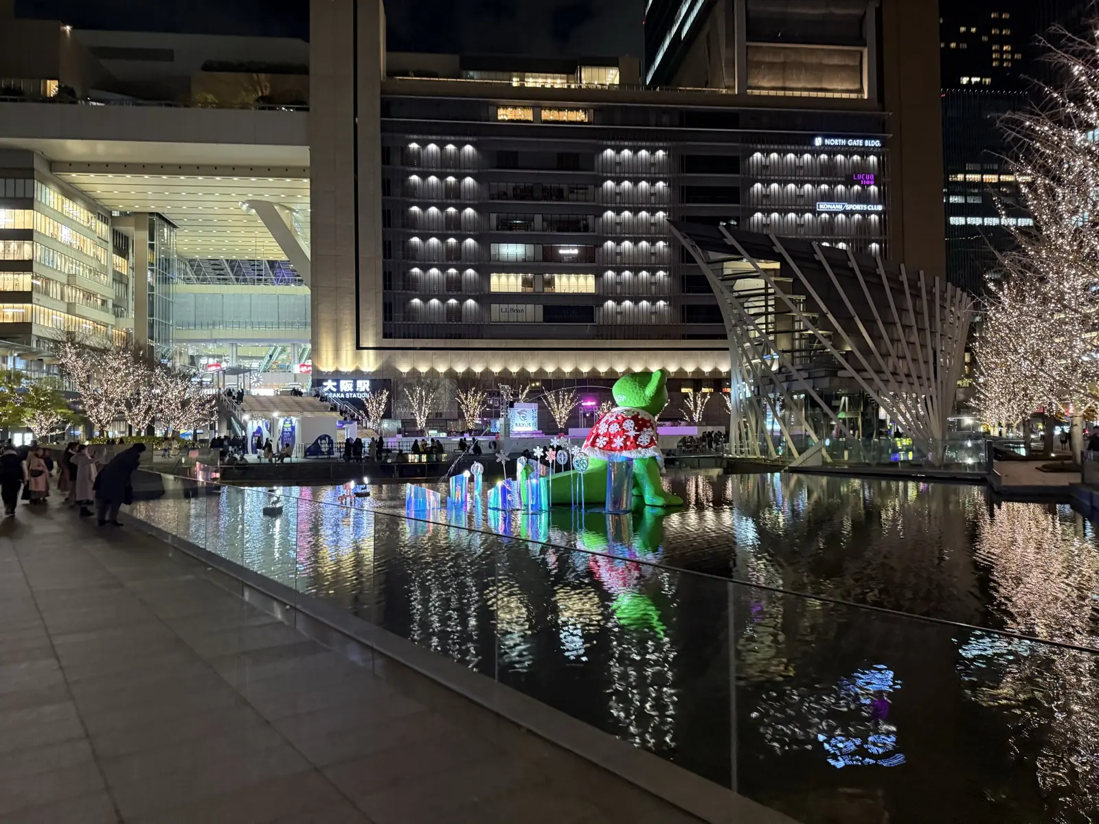 Osaka at night — the illuminated Umekita water plaza outside Osaka Station