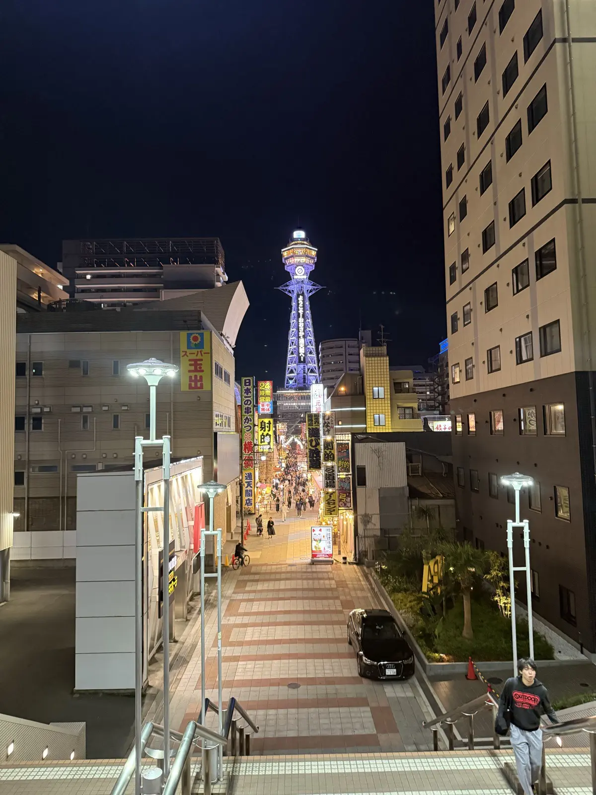Tsutenkaku Tower lit up at night in the Shinsekai district, Osaka
