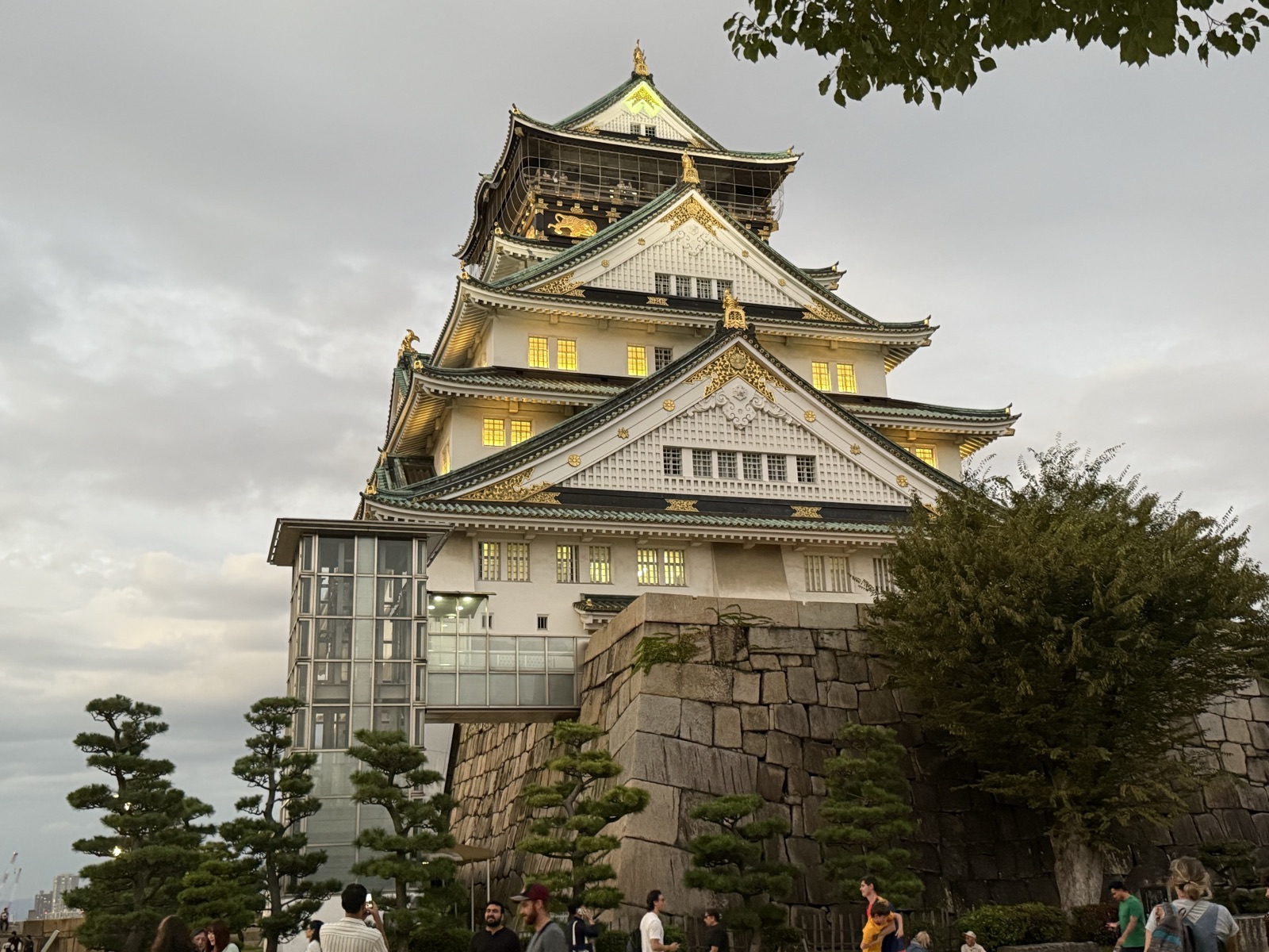 Osaka Castle illuminated in the evening